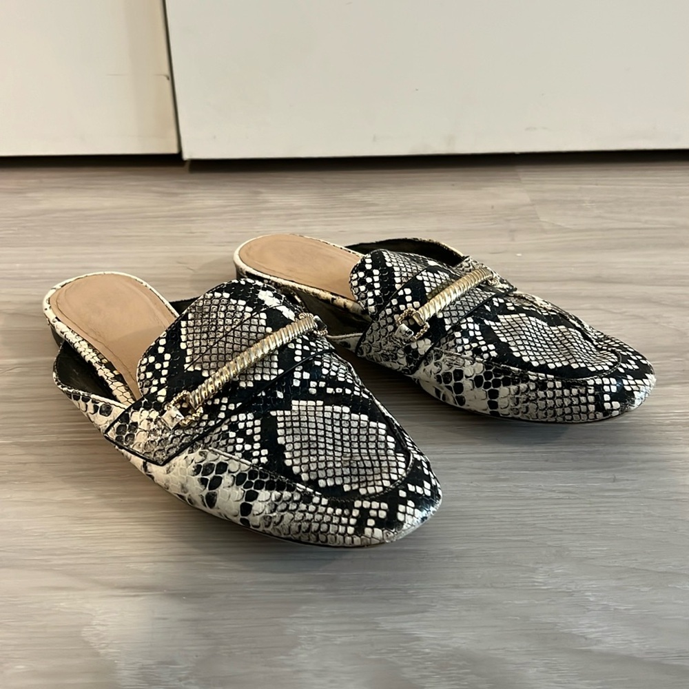 Snakeskin slip on flats